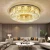 Import luxury round crystal ceiling light stainless steel  living room hotel decorative ceiling luminous two extruded tube lighting from China