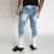 Import Mens jeans 2021 skinny fitting whiskering bleach wash stretch denim jeans with distressing knee and zipper ankle from China