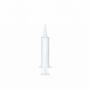 white plastic animal paste syringe 5 ml for packaging medicine or supplement
