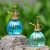 Import wholesale small glass watering can for flower self watering pot from China