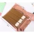 Import wholesale vintage style roll type pen bag imitation shutter leather pirate treasure map pen pouch/students pencil bags/pockets from China