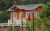 Import wooden modern prefab log cabin one floor wooden house from China