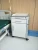 Import HPL hospital storage cabinet medical bedside table with wheels from China