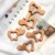 Import Natural Food Grade Beech Wood Olive oil Animal Wooden Teether For Baby DIY Accessories from China