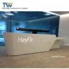 The white reception desk with LED LOGO