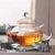 Import 400ml/600ml/800ml/1000ml wholesale glass teapot with steel filter transpare heat resistant glass teapots with glass infuser from China