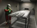 Automatic sand blasting booth