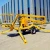 Import CE ISO IPAF Mobile electric diesel new used rental lease hire tractor crank arm articulated hydraulic boom lift For Painting from China