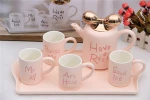 Creative European teacup ceramic water coffee cup tea set Simple home living room cup set with pot tray and bowknot lid