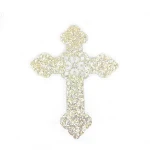 Gold glitter cross shape iron on