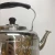 Import High quality stainless steel ring sound kettle/whistling kettle with plastic handle from China