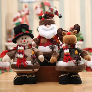 Snowman elk standing pose presents Father Christmas presents a Christmas ornament gift from a hotel store christmas elf