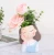 Import Superior quality tabletop decoration girls head resin flower vases from China
