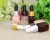 Import 10ml PET plastic brown pink transparent color Aroma Bottle with buret cap from China