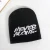 Import 1pc High Quality NEVER ALONE All Over Print Designer 100% Acrylic Jacquard Cuffless Sport Beanie for Outdoor from China