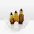 5ml 10ml 15ml 20ml 30ml 50ml 100ml Amber Dropper Glass Bottle with Rubber Head Child Resistant Bamboo Wooden Cap