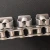 Import China conveyor chain manufacturer supply double pitch stainless steel C2080 conveyor chain with a1 attachment from China