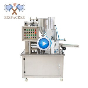 China factory rotary type automatic coffee capsule cup filling and sealing machine