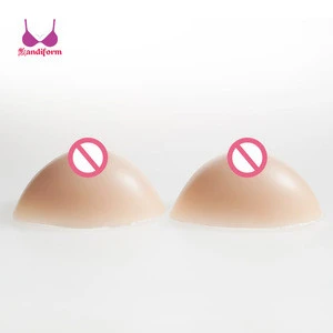 Custom 2000g soft adhering silicone false bouncy breast forms for women