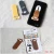 Customized cartoon cell phone handle finger grip silicone sticky elastic cell phone mobile holder security strap for iphone