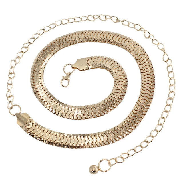 Fashionable and elegant gold women&#x27;s waist chain dress decorated with large metal ring belt