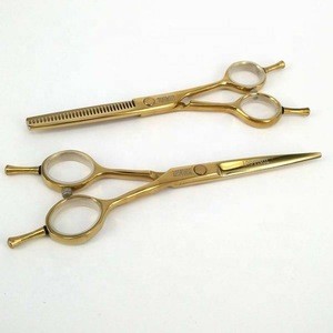 golden barber hair dressing scissor with bumpers