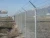 Import metal galvanized chain link wire mesh fence with barbed wire (ISO Factory &amp; Exporter) from China