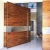 Import Residential Front Entry Pivot Wood Door Veneer Solid Core Wood Door from China