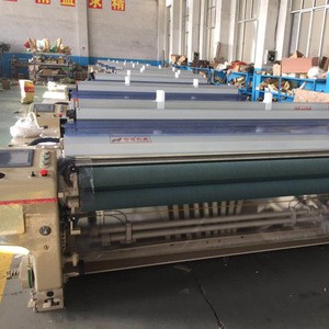 Textile weaving machine double nozzle water jet loom