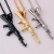 Import The army mens stainless steel weapons gun pendant ak 47 gun pendant gold titanium necklace from China