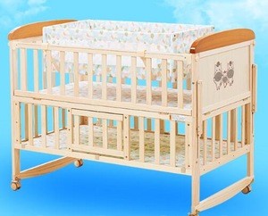 The multifunctional pine baby bed Folding adjustable wooden baby crib