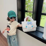 New cartoon plush bag Girl s 2024 Winter new grab machine doll children's action doll handbag Children's handbags
