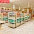 Import Heavy duty moder mdf wooden melamine mini market display shelves department store food display racks from China