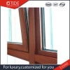 Aluminum & wood Tilt-Turn window with thermal break series produced by double-headed sawing machine from Italy
