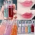 Import Cappuvini transparent watery glitter lip gloss pearlescent glass lip lipstick  base moisturizing natural jelly overlay lip gloss from China