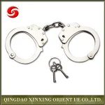 carbon steel and police handcuff