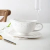 China wholesale unique custom kitchen sauce jug small cheap white porcelain gravy boat with stand