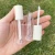 Import JANCY PACK 4ml wholesale 100pcs round clear round clear custom white pink lip gloss tubes container with wands from China