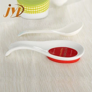 New design assorted color personalized ceramics spoon rest with silicone