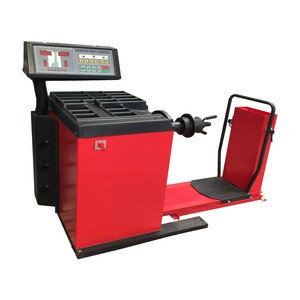 wheel alignment and balancing machine for the heavy tire