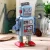 Import Worldwide Hot Selling Vintage Mechanical Clockwork Wind Up Metal Walking Robot Tin Toy Kids Gift from China