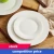 Import 7 inch custom eco stock flat white round porcelain dinnerware restaurant cold plate cheap hotel dishes from China