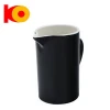 Black large ceramic milk jug and colorful glazed ceramic mini milk jug