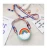 Import Colorful Silicone Coin Purse Lovely Round Shape Wallet Girls Pouch Keychain Zipper Coin Purse Kids Bag from China