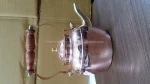 Copper tea kettle with wooden handle