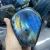 Import High quality natural healing stones feng shui folk crafts blue flashy labradorite freeform for decoration from China