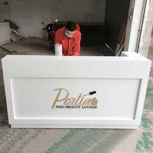 Modern white reception desk with logo for beauty salon SY-RD012