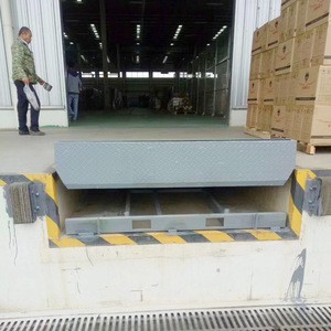 Three years warranty Good quality load capacity 6ton-15ton Stationary Dock Leveler for warehouse Cargo loading use