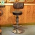 Import unique  design adjustable leather seats bar chair with back metal swivel bar stool with footrest from China
