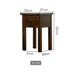 Wooden hotel nightstand bedside table